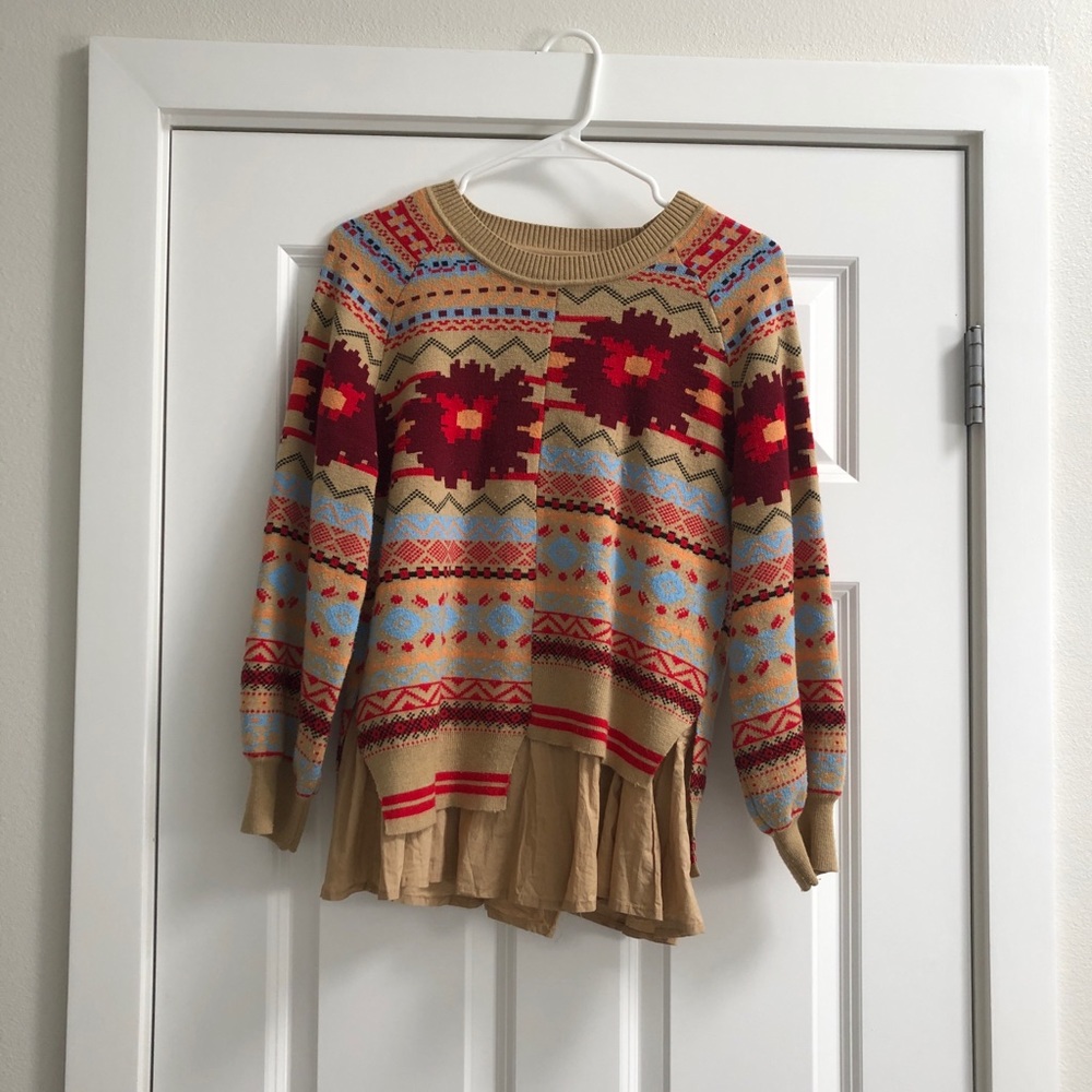 Patterned asymmetrical cut sweater
